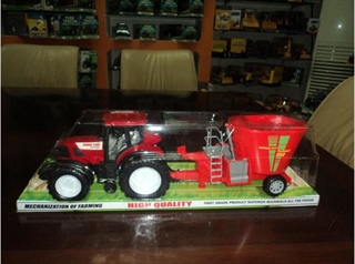 Traktor z maszyną czerwoną 48cm klosz